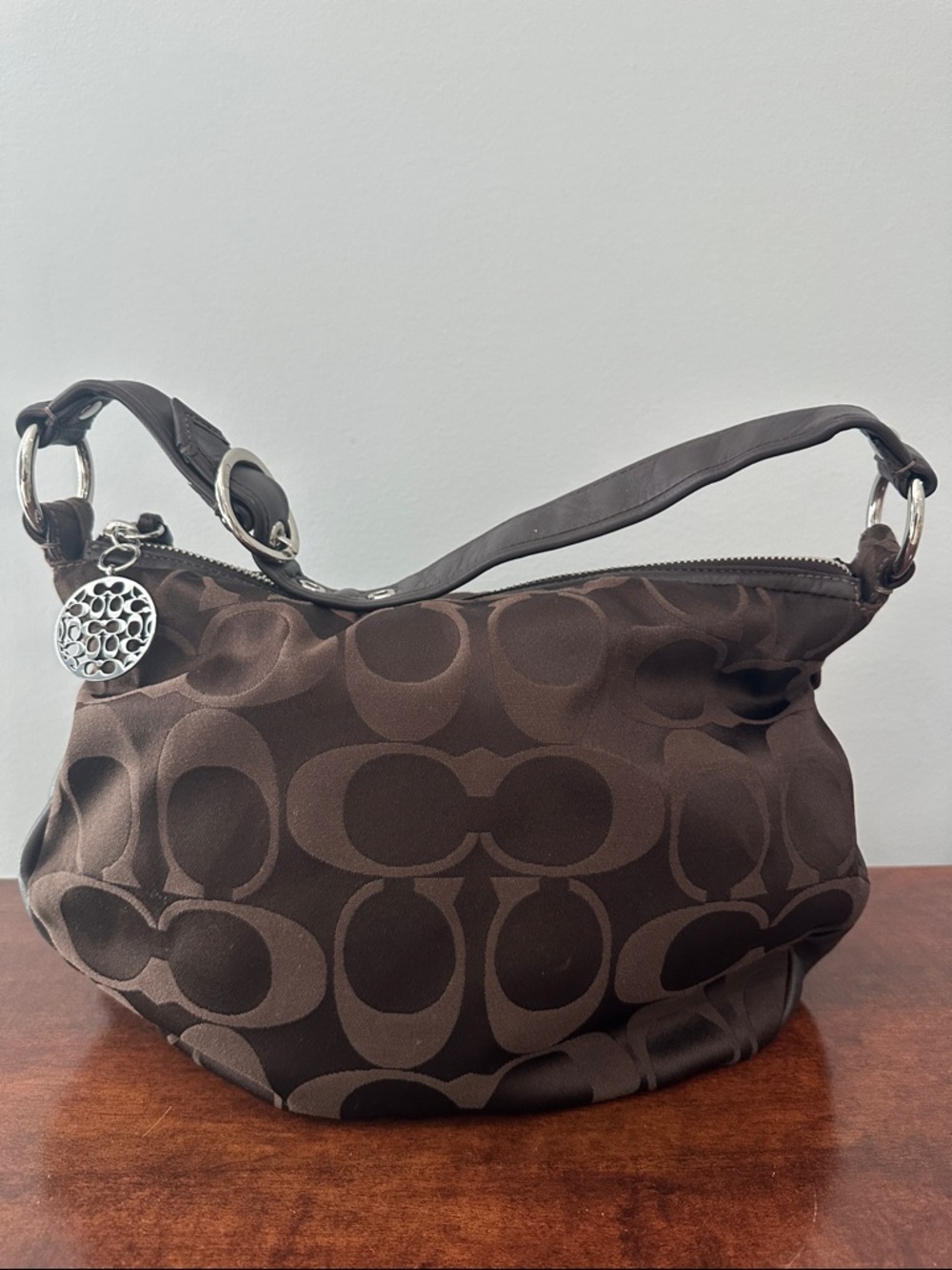Coach Brown Signature Canvas Hobo with Silver Charm Accent